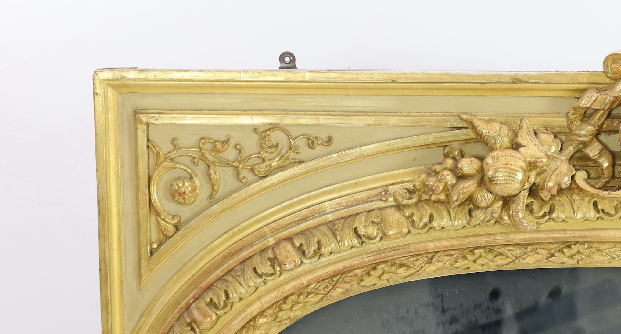 A late 19th century French carved giltwood wall mirror, W.146cm H.171cm